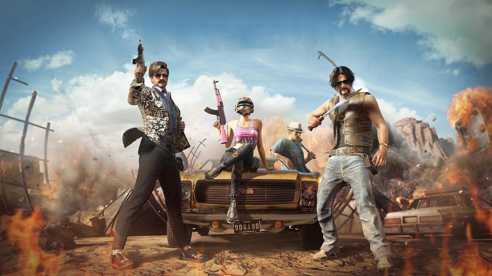 Four rugged survivors pose with guns in a desert battlefield, a damaged car in the foreground and smoke and flames around.