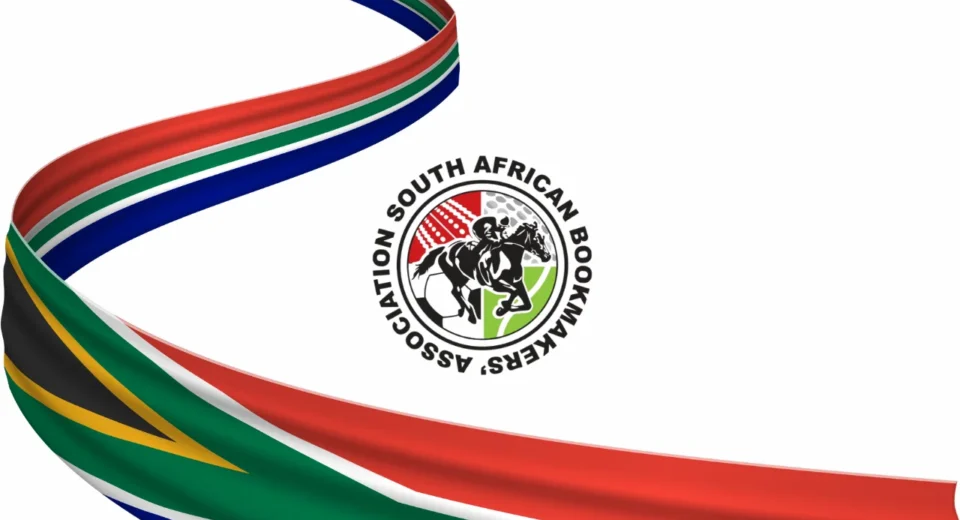 Ribbons in South African flag colors loop around a circular logo that reads 'Association South African Bookmakers' on a white background.