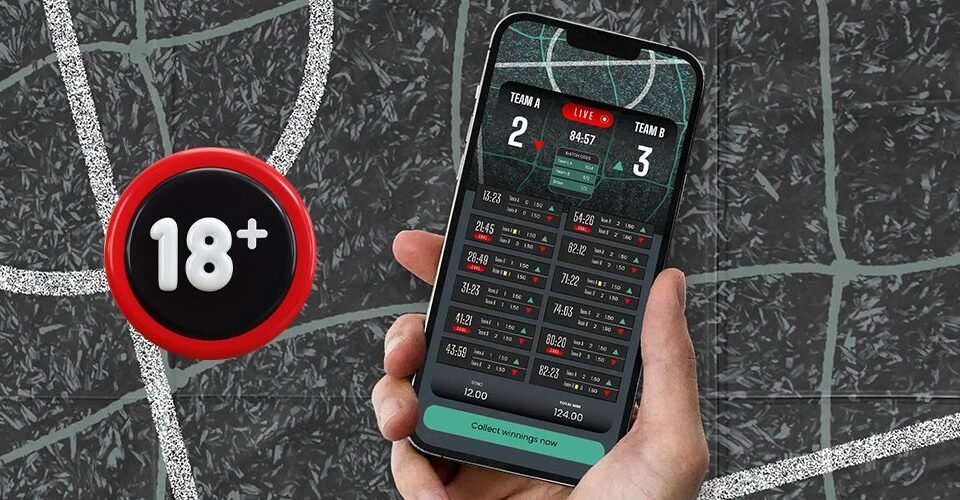 Hand holding a smartphone displaying a live scoreboard and betting stats on a dark court, with a prominent 18+ badge nearby.