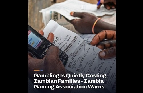 Headline reads: 'Gambling Is Quietly Costing Zambian Families - Zambia Gaming Association Warns' with a close-up of hands handling a receipt/bill and a mobile phone in the foreground.